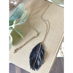 Long black leather pendant necklace